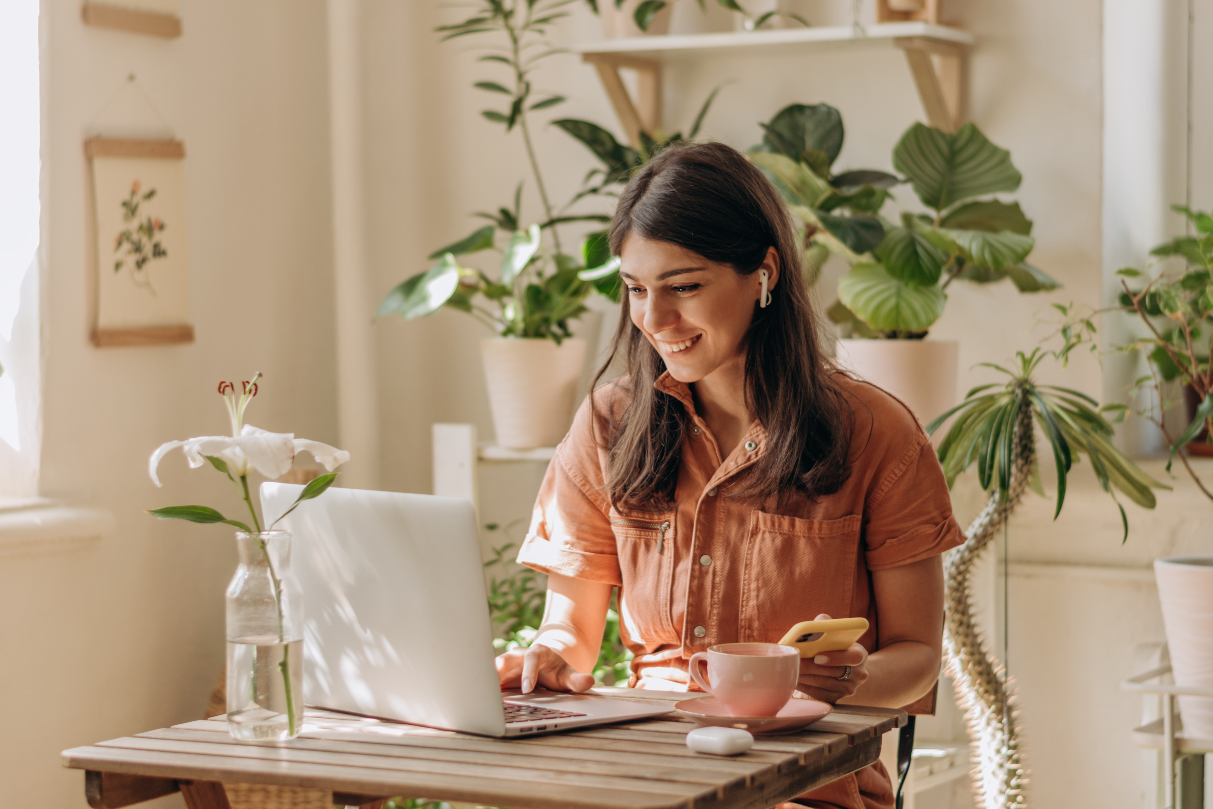 Person smiling at laptop